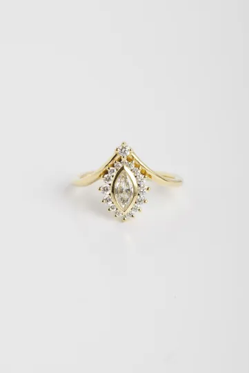The Castille ring, in 18k gold set with a marquise diamond and accompanied by brilliant-cut diamonds.