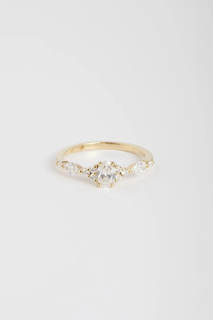 A Sirène L ring in 18k white gold set with a central marquise-cut diamond and accompanied by a gradient of marquise-cut diamonds. A Sirène L ring in 18k white gold set with a central marquise-cut diamond and accompanied by a gradient of marquise-cut diamonds.