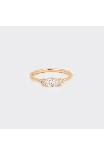 <p>The Mathilde S ring in 750‰ rose gold, set with a marquise-cut diamond, accompanied by brilliant-cut diamonds.</p>