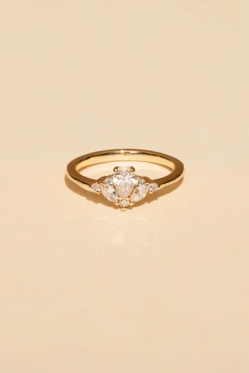 The Antoine S ring in 18k rose gold set with a 0.30ct pear-shaped central diamond and accompanied by marquise and brilliant diamonds.