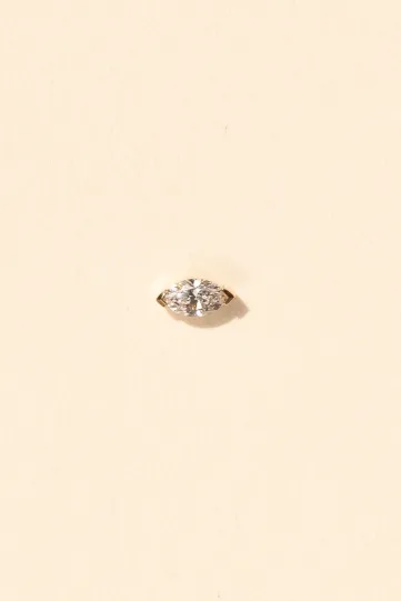 The Hana earring in 18k rose gold set with a 0.10ct marquise-cut diamond.